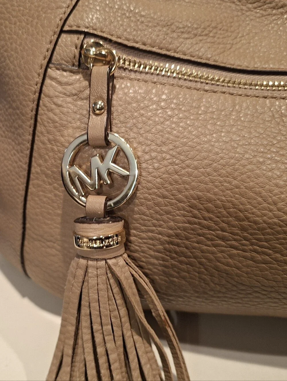 Michael Kors Beige Pebbled Leather Hobo with Tassel Charm
